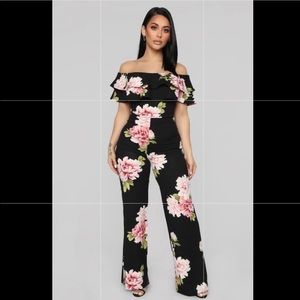 Floral Jumpsuit Size Small. Never worn. With tag